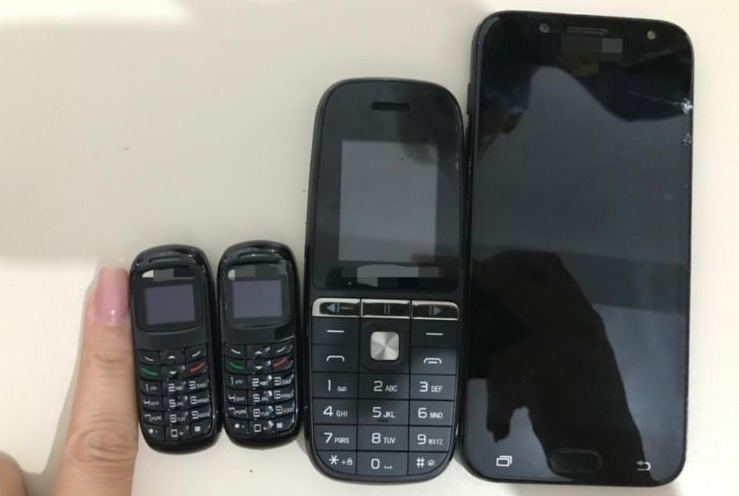 A quantidade de aparelhos recuperados diminuiu de 5.191 celulares, em 2020, para 2.419, em 2021. O número de interceptações de armas brancas caiu de 358, em 2020, para 166, neste ano. | Foto: Reprodução/Segurança Pública