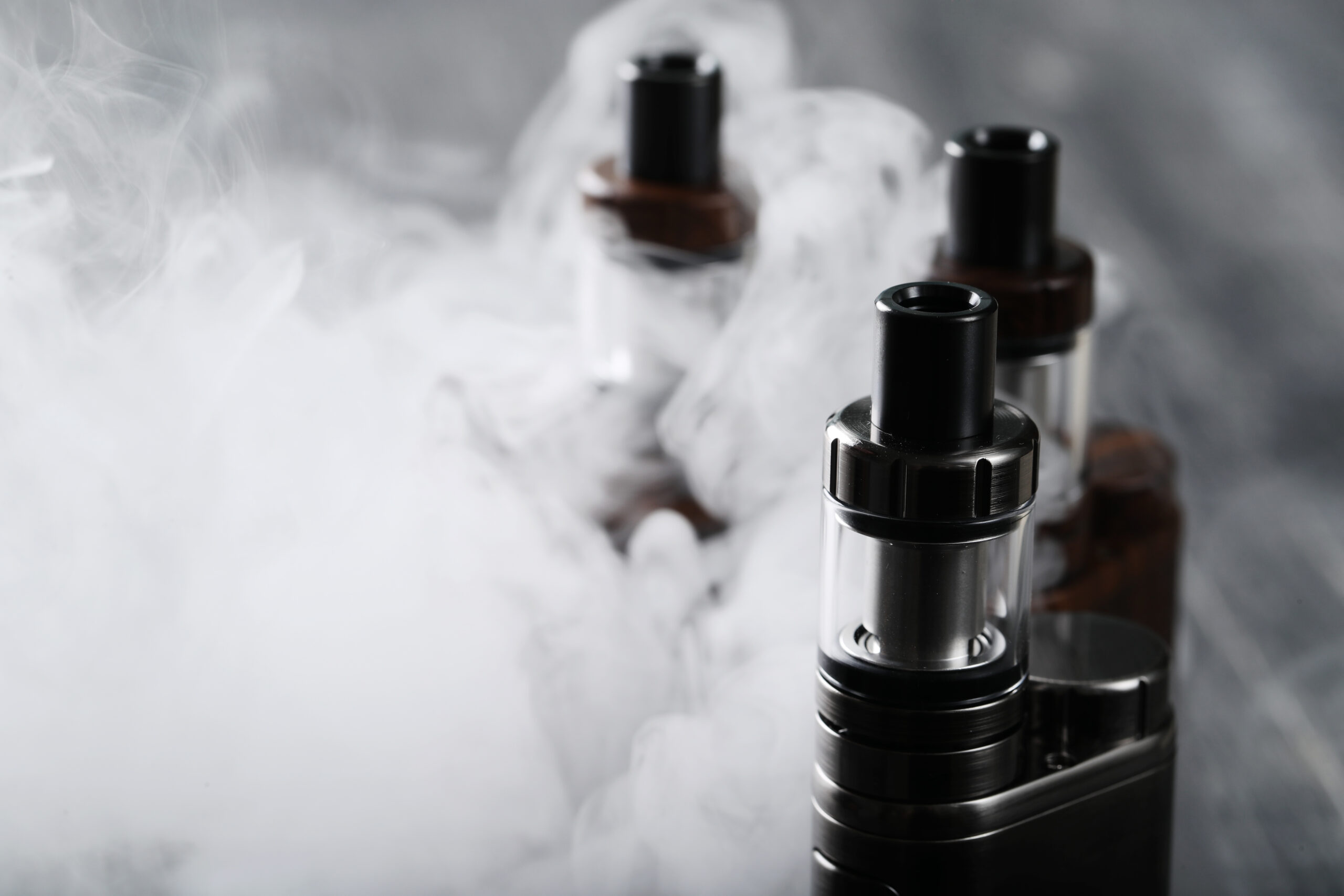 Vaping device on the wooden table