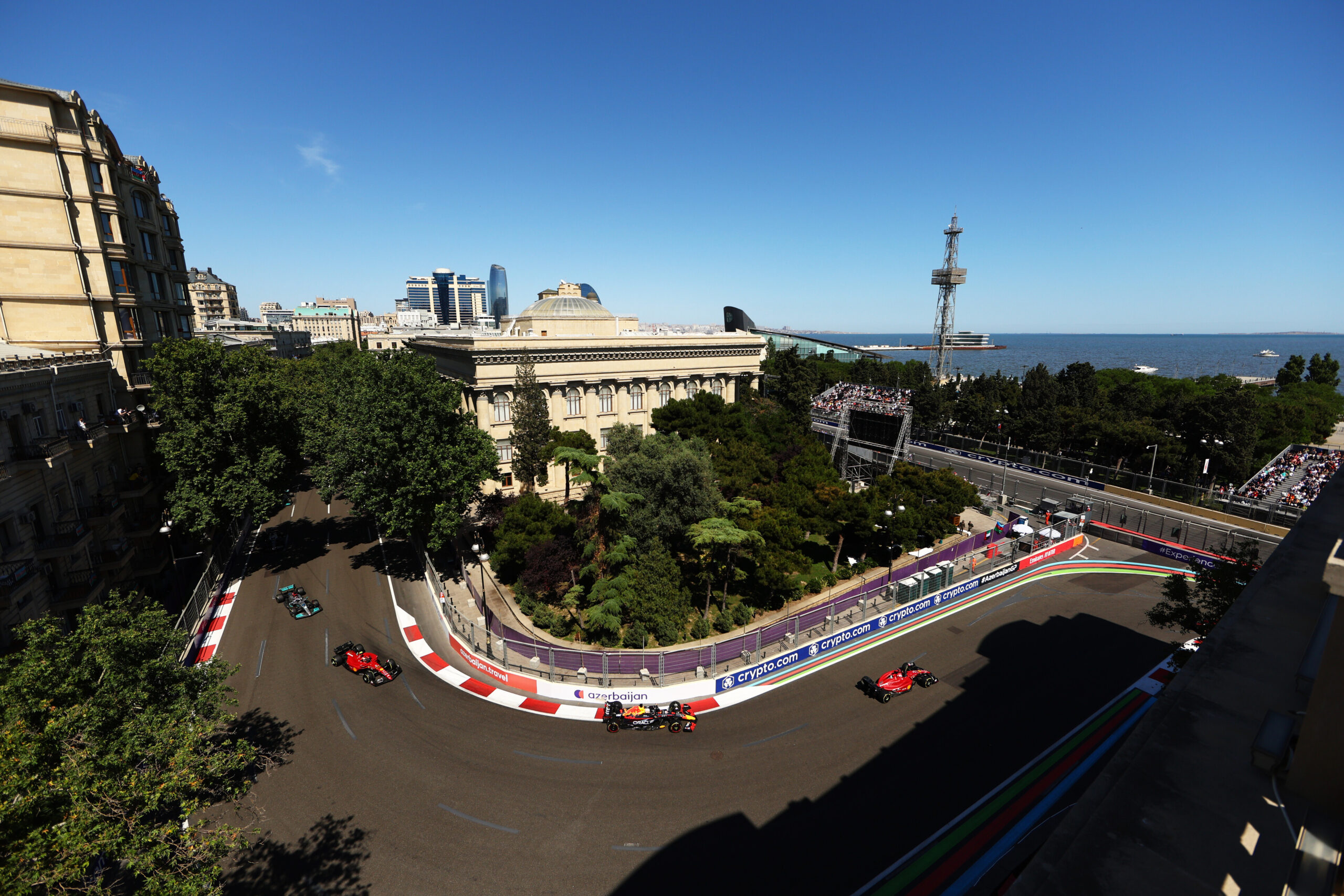 BAKU, AZERBAIJAN - JUNE 12: Charles Leclerc of Monaco driving the (16) Ferrari F1-75 leads Max Verstappen of the Netherlands driving the (1) Oracle Red Bull Racing RB18 and Carlos Sainz of Spain driving (55) the Ferrari F1-75 during the F1 Grand Prix of Azerbaijan at Baku City Circuit on June 12, 2022 in Baku, Azerbaijan. (Photo by Clive Rose/Getty Images) // Getty Images / Red Bull Content Pool // SI202206120234 // Usage for editorial use only //