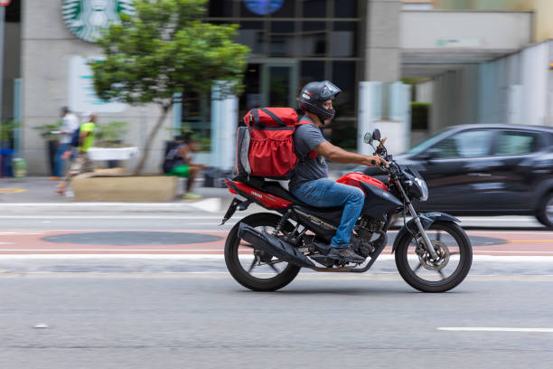 São Paulo, SP, Brazil, MAR 12 2022, food delivery guy on Paulista avenue