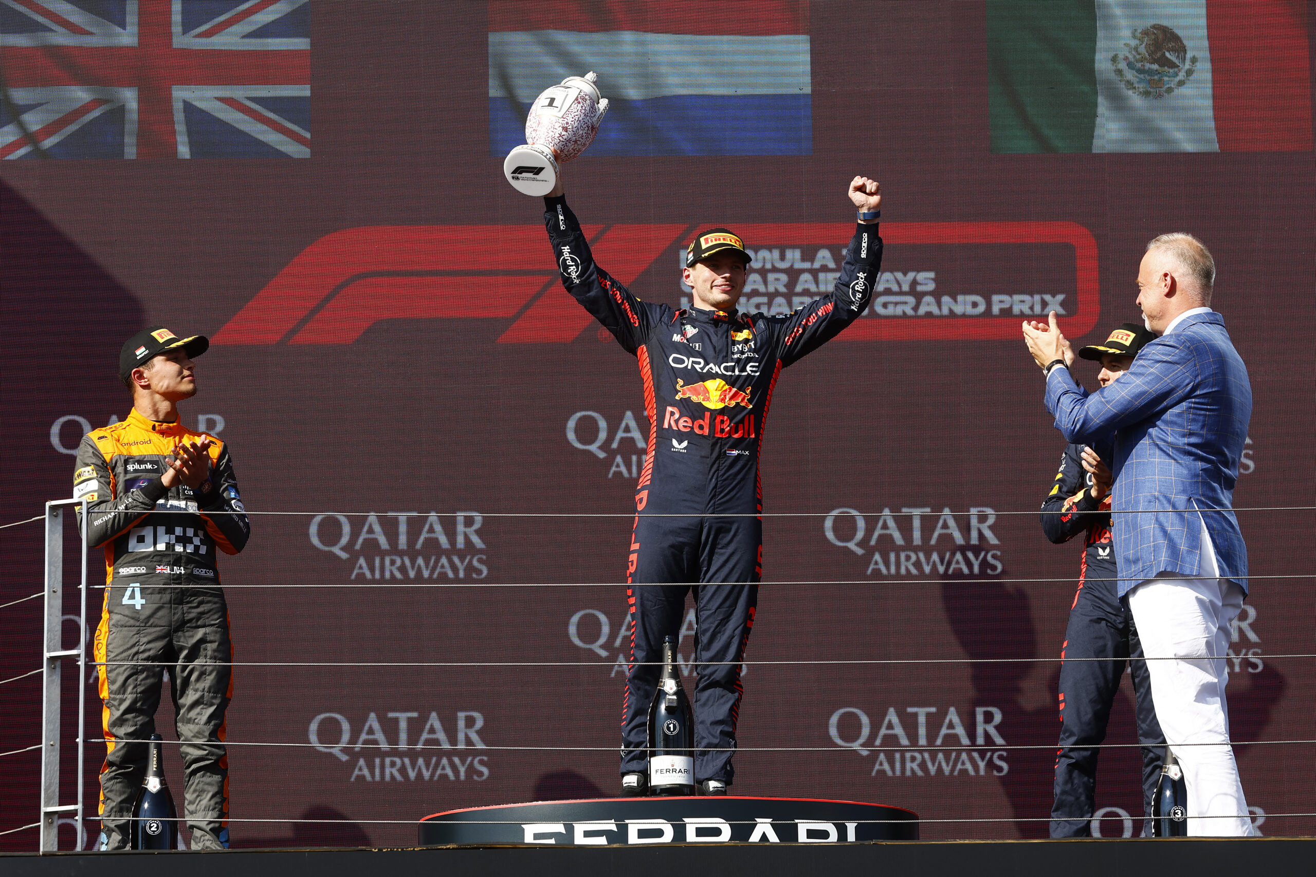 BUDAPEST, HUNGARY - JULY 23: Race winner Max Verstappen of the Netherlands and Oracle Red Bull Racing celebrates on the podium during the F1 Grand Prix of Hungary at Hungaroring on July 23, 2023 in Budapest, Hungary. (Photo by Francois Nel/Getty Images) // Getty Images / Red Bull Content Pool // SI202307230761 // Usage for editorial use only //
