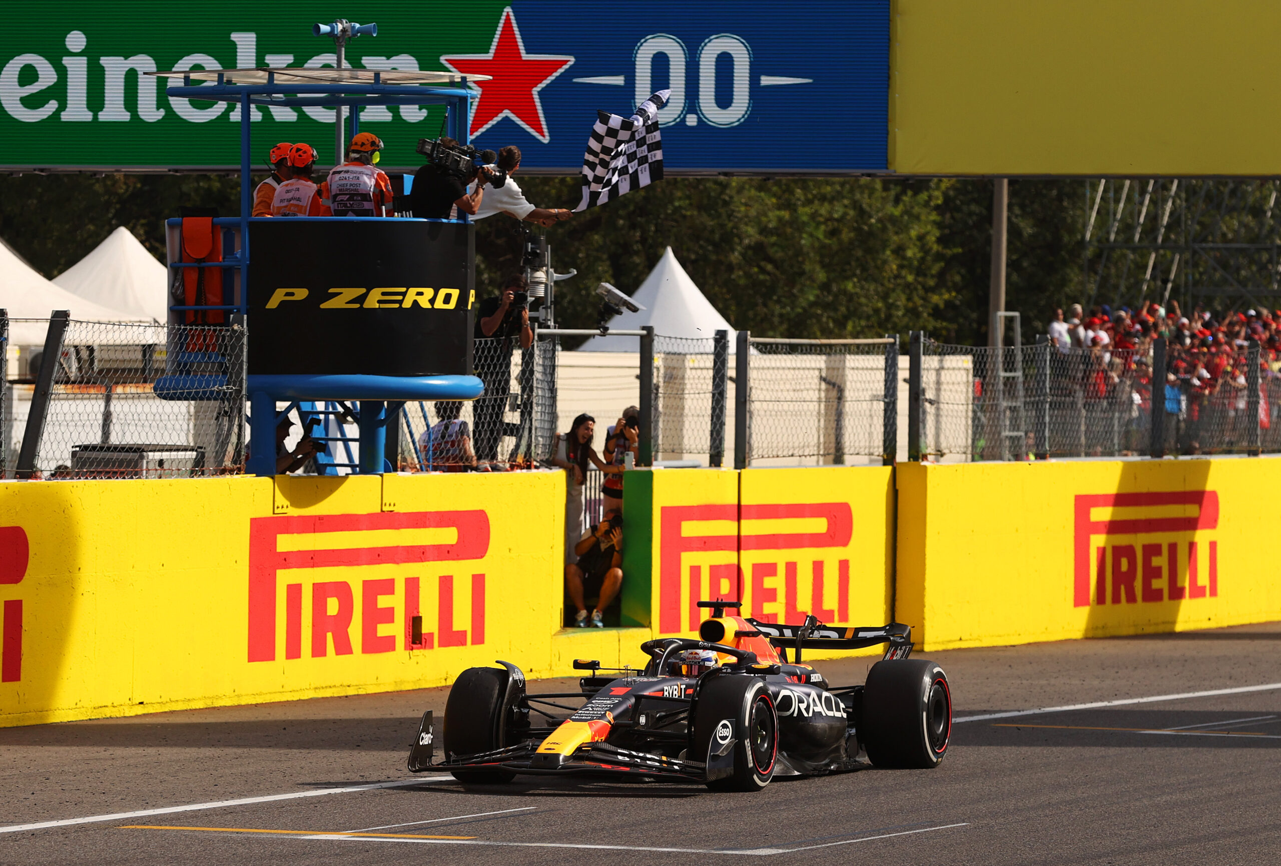 MONZA, ITALY - SEPTEMBER 03: Race winner Max Verstappen of the Netherlands driving the (1) Oracle Red Bull Racing RB19 takes the chequered flag during the F1 Grand Prix of Italy at Autodromo Nazionale Monza on September 03, 2023 in Monza, Italy. (Photo by Ryan Pierse/Getty Images) // Getty Images / Red Bull Content Pool // SI202309030370 // Usage for editorial use only //