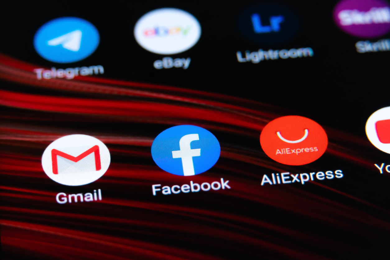Batumi, Georgia - February 5 2022: Close-up of gmail, Facebook, Aliexpress icons on a mobile phone. Displaying social network icons on a smartphone.