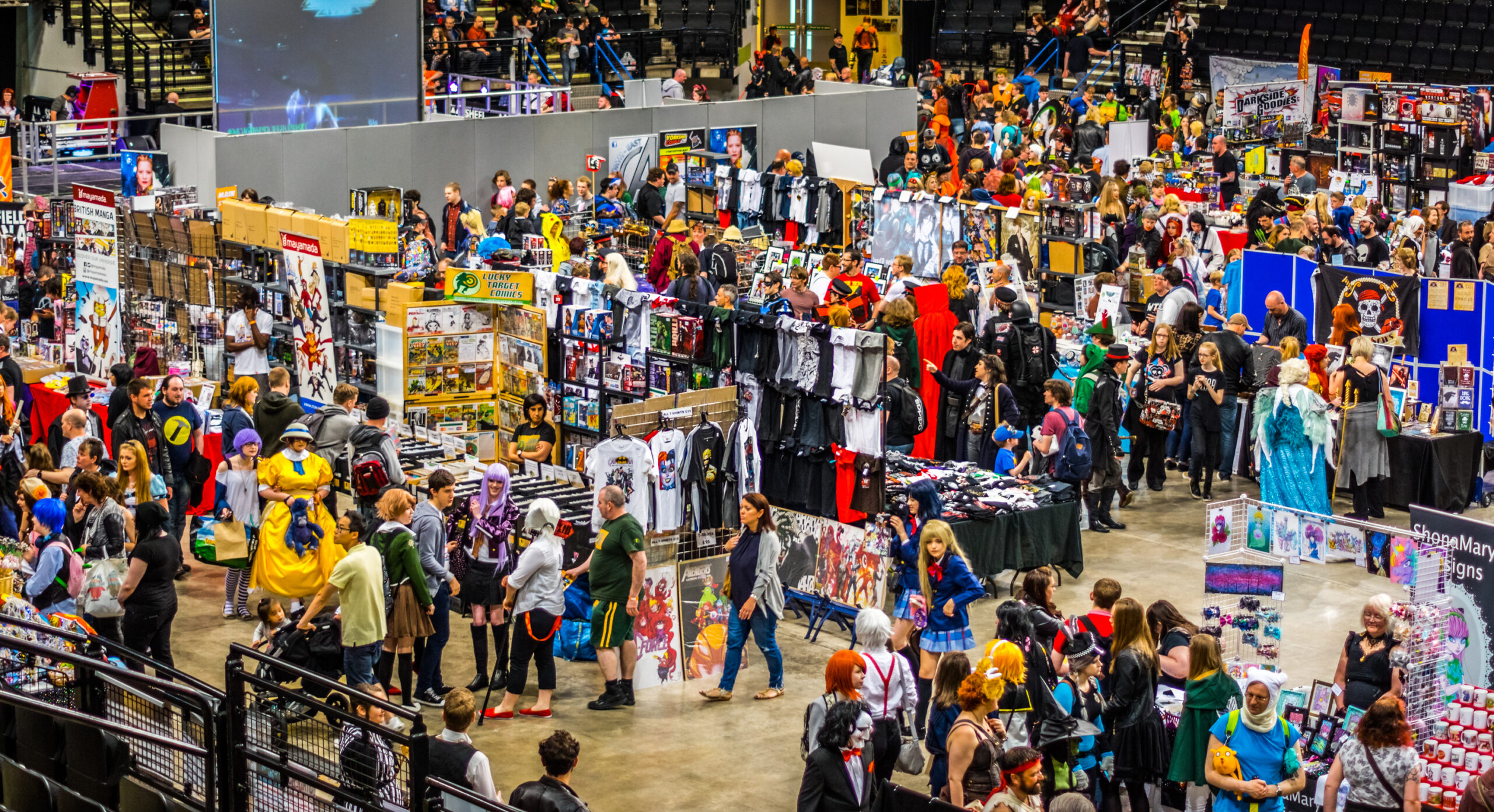 Sheffield, United Kingdom - June 11, 2016: Crowds enjoying the stalls selling character goods and costumes  at the Yorkshire Cosplay Convention at Sheffield Arena