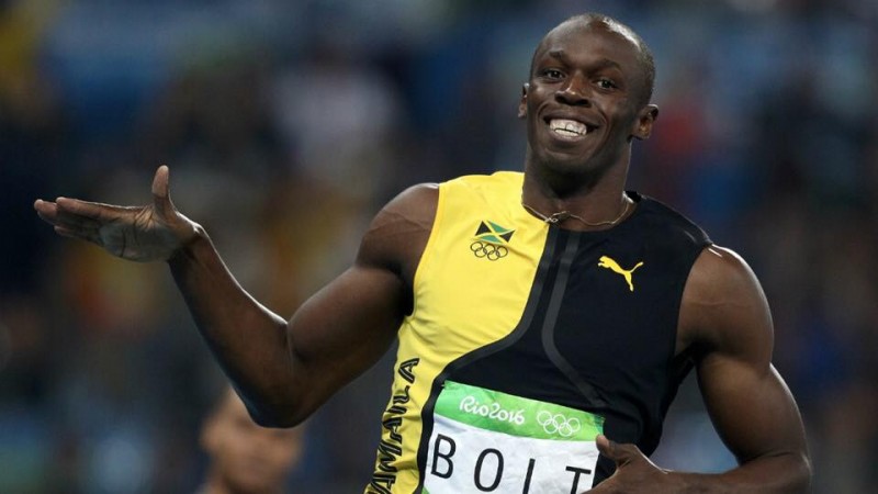 Imagem Ilustrando a Notícia: Usain Bolt faz história com tricampeonato nos 100 metros rasos