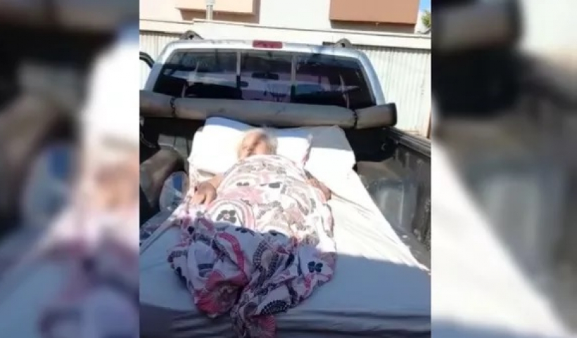 Imagem Ilustrando a Notícia: Sem ambulância, idosa é levada ao hospital na carroceria de caminhonete após passar mal; vídeo