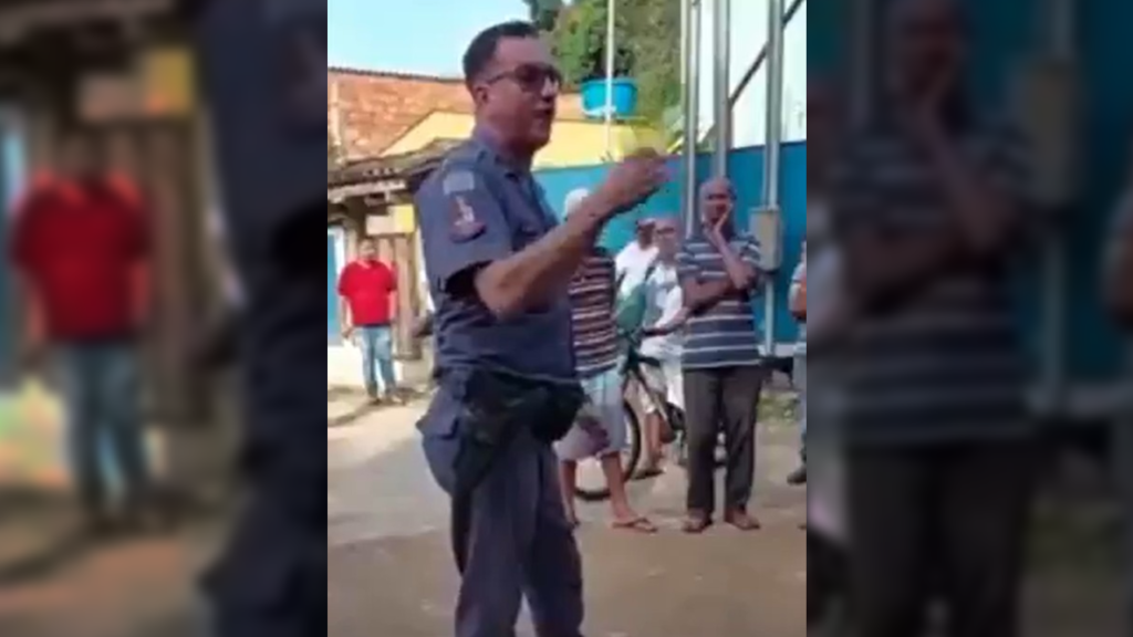 Imagem Ilustrando a Notícia: Policial filmado ao dizer que ‘governo comunista’ vai tirar casas de moradores será investigado pela PM