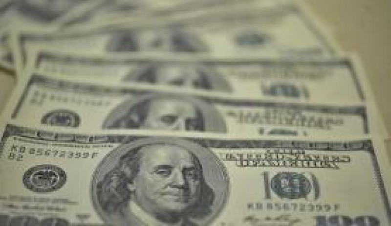 Imagem Ilustrando a Notícia: Dólar aproxima-se de R$ 3,13 após Banco Central cortar juros