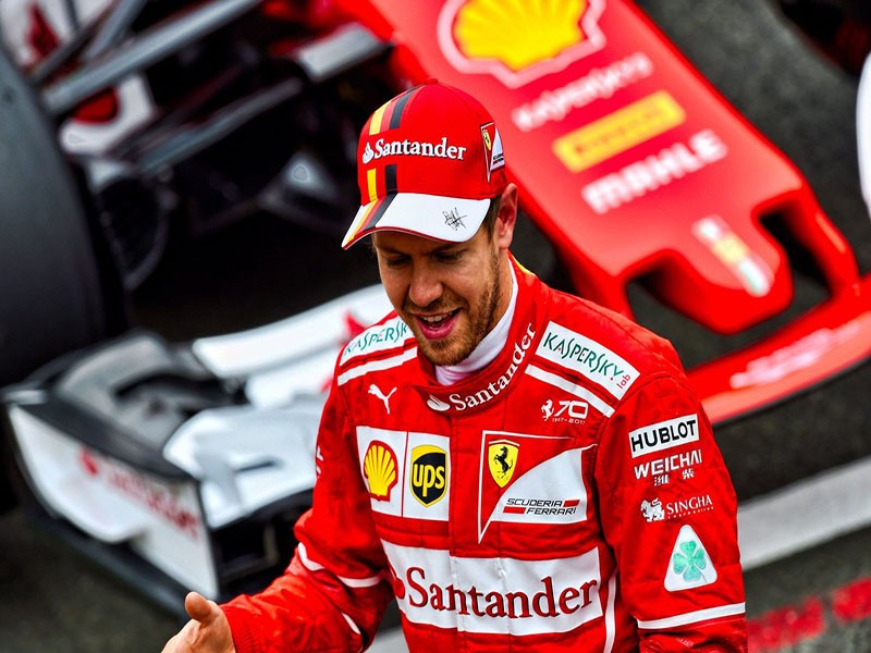 Imagem Ilustrando a Notícia: Vettel se posiciona contra a abolição das grid girls