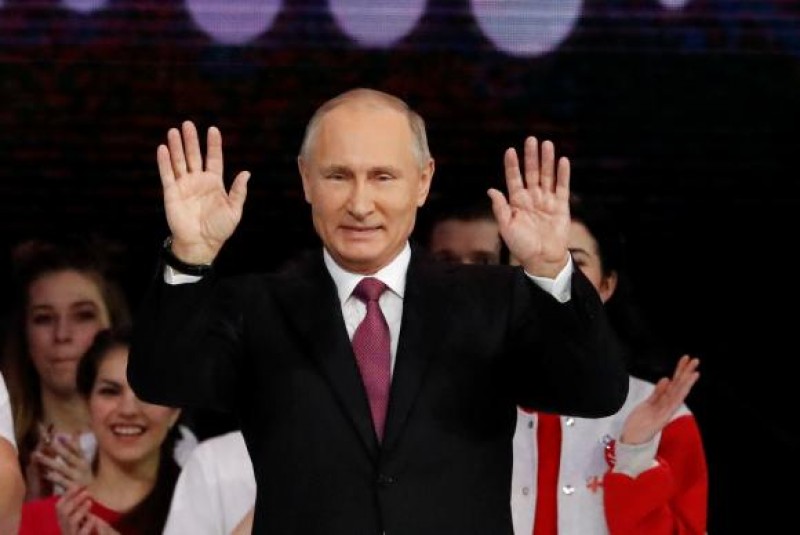 Imagem Ilustrando a Notícia: Putin vota nas eleições presidenciais