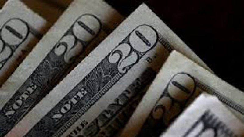 Imagem Ilustrando a Notícia: Dólar fecha semana em baixa e Bovespa sobe