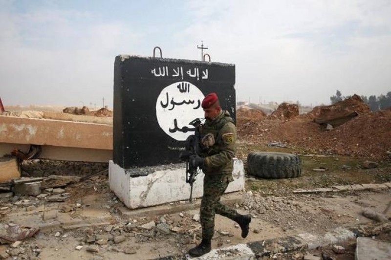 Imagem Ilustrando a Notícia: Atentado do Estado Islâmico mata mais de dez agentes das forças do governo sírio