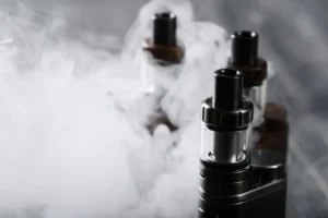 Vaping device on the wooden table