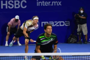 Na madrugada desta quarta-feira (23), em parceria com o alemão Alexander Zverev, não passou pelo britânico Glasspool e pelo finlandês Heliovaara na primeira rodada no México | Foto: Divulgação Twitter (@AbiertoTelcel)