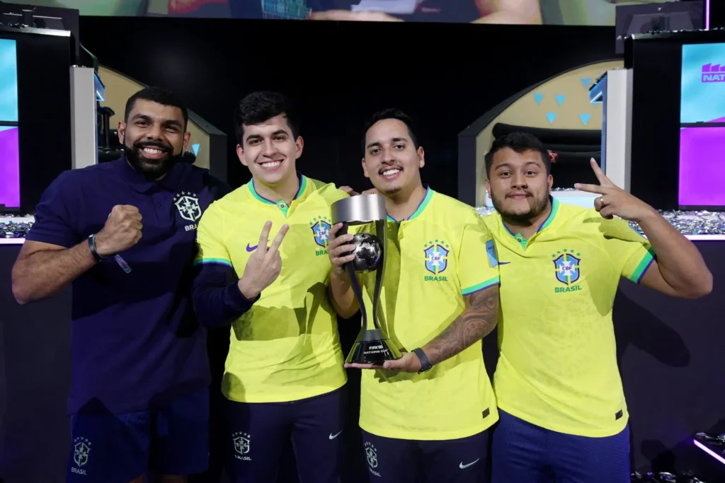 RIYADH, SAUDI ARABIA - JULY 14: Gabriel Gabgol, Coach of Brazil, Paulo Roberto Xavier de Brito Neto (PauloNeto999), Paulo Henrique de Souza Chaves Ferreira (PHzin) and Pedro Henrique Resende Soares (Resende) of Team Brazil pose for a photo with the FIFAe Nations Cup Winner's Trophy following victory in the Final Match between Netherlands and Brazil during day four of the FIFAe Nations Cup 2023 on July 14, 2023 in Riyadh, Saudi Arabia. (Photo by Gonzalo Arroyo - FIFA/FIFA via Getty Images)