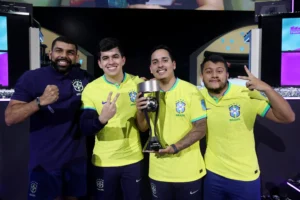 RIYADH, SAUDI ARABIA - JULY 14: Gabriel Gabgol, Coach of Brazil, Paulo Roberto Xavier de Brito Neto (PauloNeto999), Paulo Henrique de Souza Chaves Ferreira (PHzin) and Pedro Henrique Resende Soares (Resende) of Team Brazil pose for a photo with the FIFAe Nations Cup Winner's Trophy following victory in the Final Match between Netherlands and Brazil during day four of the FIFAe Nations Cup 2023 on July 14, 2023 in Riyadh, Saudi Arabia. (Photo by Gonzalo Arroyo - FIFA/FIFA via Getty Images)