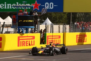 MONZA, ITALY - SEPTEMBER 03: Race winner Max Verstappen of the Netherlands driving the (1) Oracle Red Bull Racing RB19 takes the chequered flag during the F1 Grand Prix of Italy at Autodromo Nazionale Monza on September 03, 2023 in Monza, Italy. (Photo by Ryan Pierse/Getty Images) // Getty Images / Red Bull Content Pool // SI202309030370 // Usage for editorial use only //