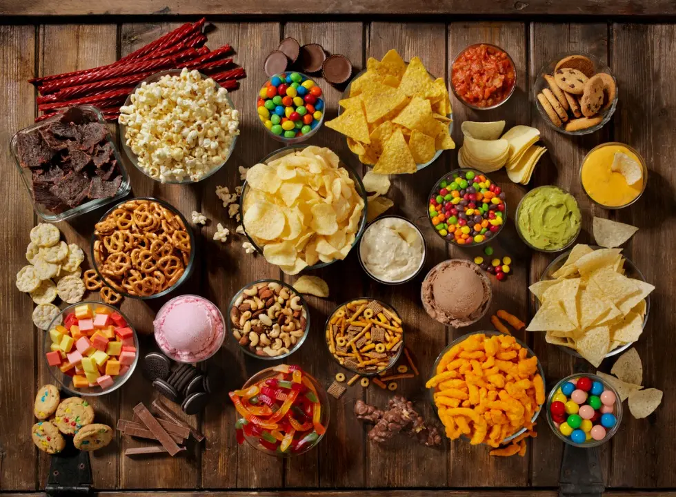 group of sweet and salty snacks perfect for binge watching picture id1149135424