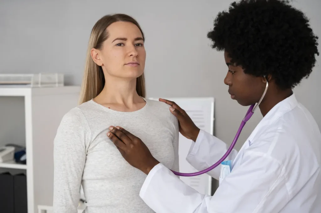 doctor using stethoscope side view