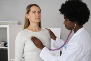 doctor using stethoscope side view