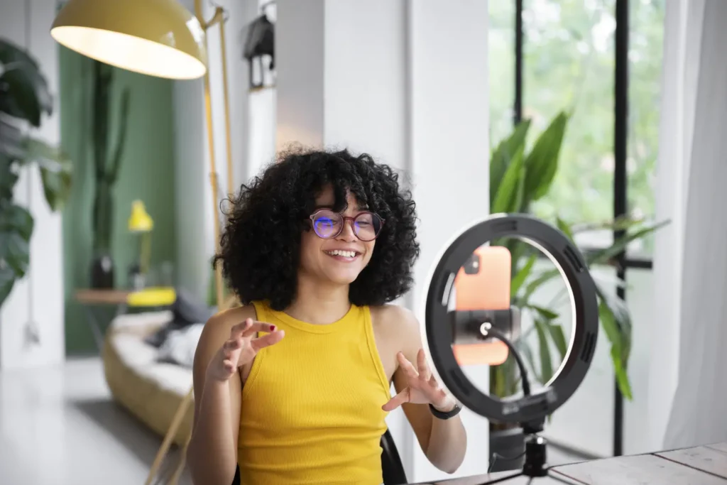 medium shot smiley woman with ring light