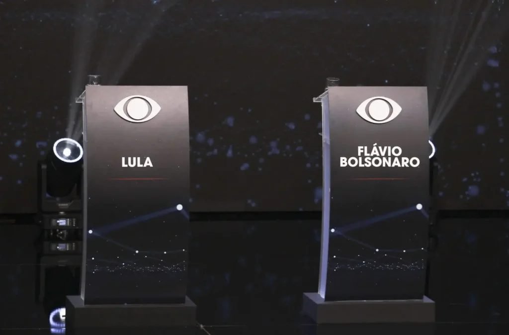 Band transmite neste domingo (18) o primeiro debate entre Lula e Flávio Bolsonaro
