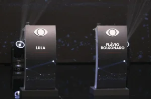 Band transmite neste domingo (18) o primeiro debate entre Lula e Flávio Bolsonaro